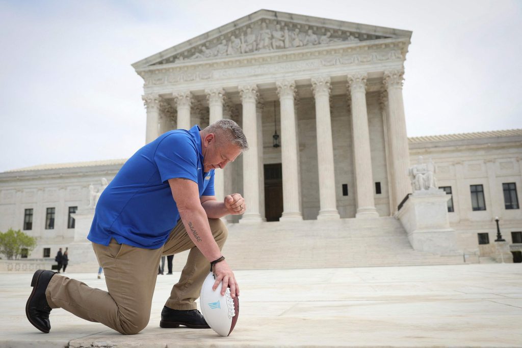 New Supreme Court ruling re-energizes religious America: School coach allowed prayer after game