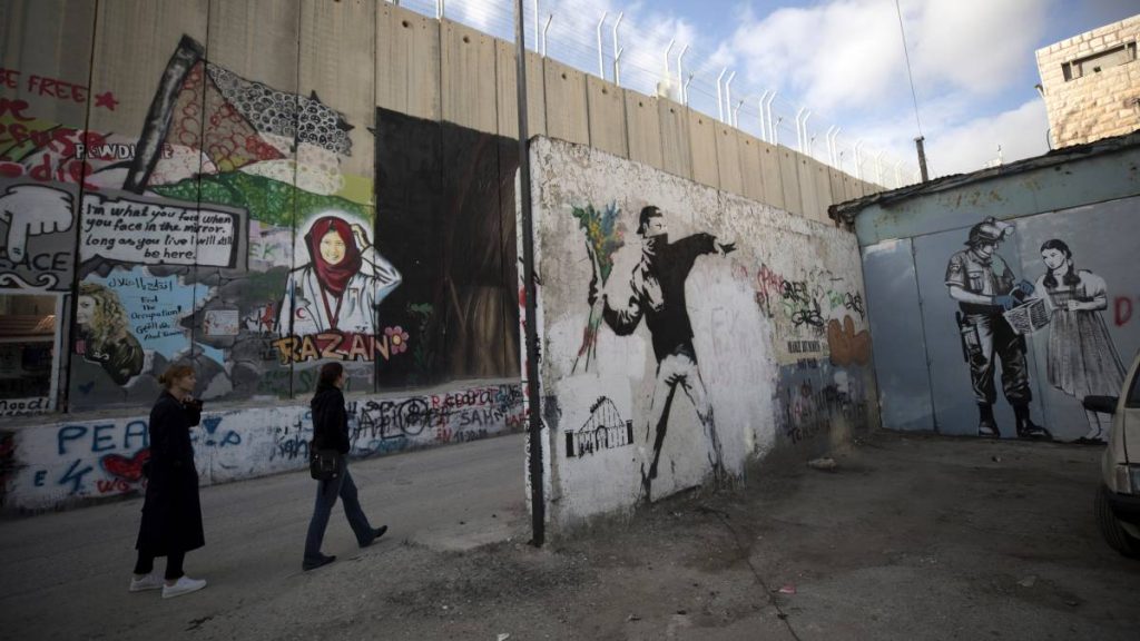 Banksy's artwork from the Bethlehem Separation Wall is shown at the Tel Aviv Gallery