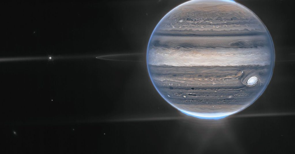 The aurora borealis and rings in a detailed image of Jupiter