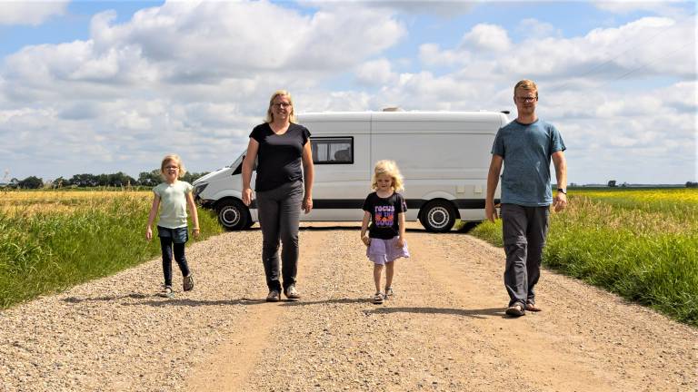 Susanne and Stephen with their camper and two daughters Gwen and Tess
