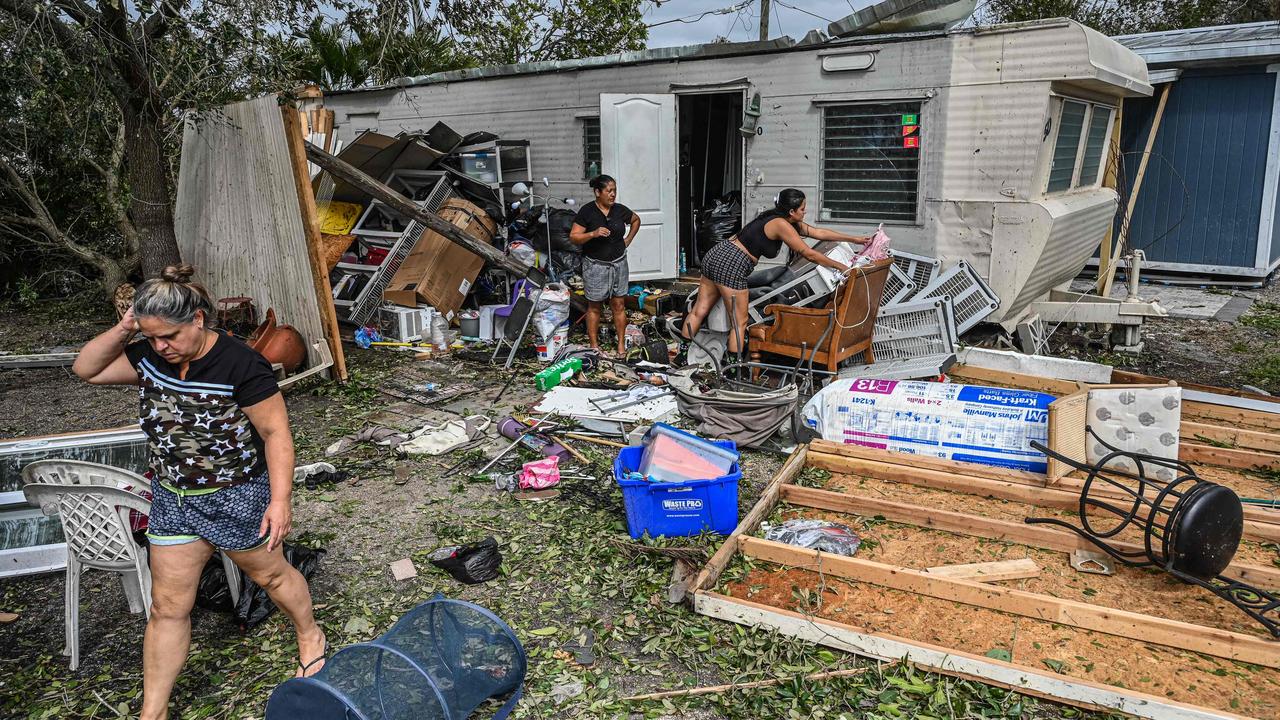 Residents of a mobile home in Fort Myers began cleaning.