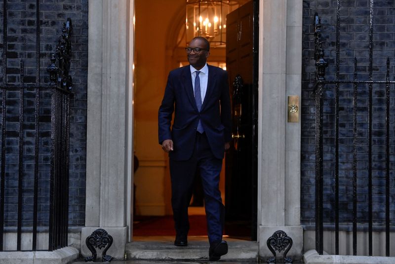 New British Health Chancellor of the Exchequer Kwasi Kwarteng steps outside Number 10 Downing Street in London