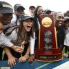 Athletes at the University of Florida celebrate the women's team during the NCAA Division I Outdoor Track & Field on June 11, 2022.